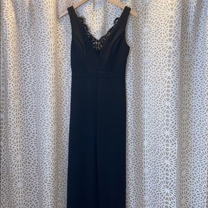Black Jumpsuit with deep cut lace